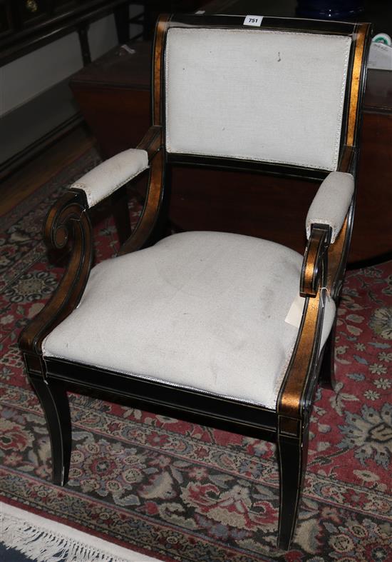 A Regency style ebonised elbow chair